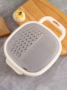 4-In-1 Multi-Purpose Vegetable Grater & Slicer with Storage Container